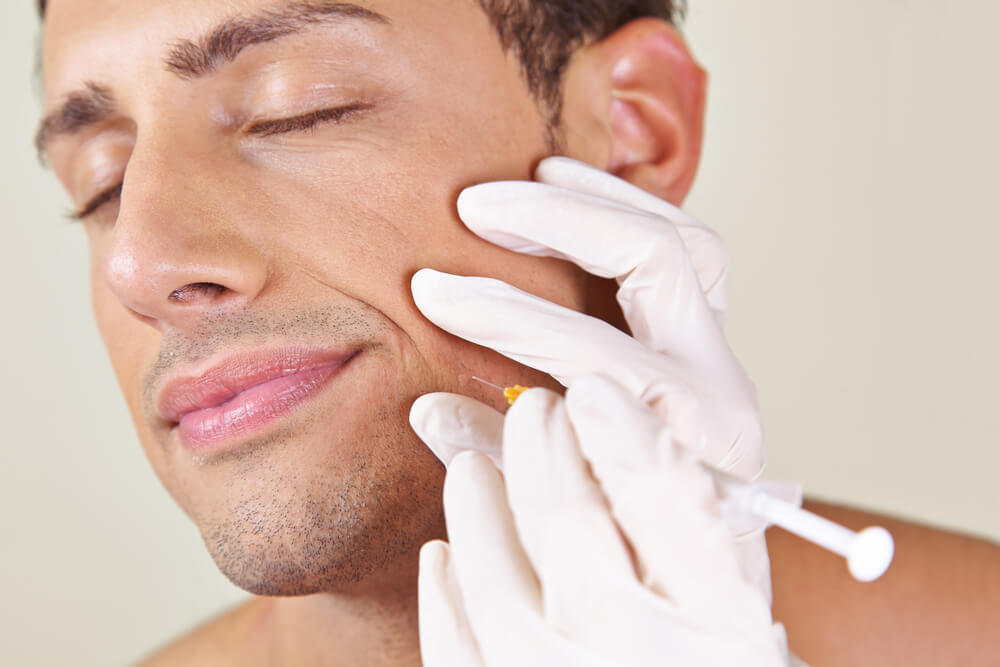 Man receiving Jaw Botox injection