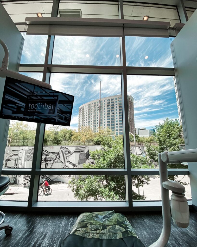 View from a Toothbar dental exam room window, showing a serene outside scene, enhancing the calm and relaxing environment for patients